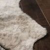 Grand Canyon Grey Ivory rug with a soft, mottled grey and ivory animal hide pattern on dark hardwood floor