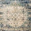 Anastasia Blue / Ivory Rug with ornate traditional distressed medallion pattern in blue and ivory tones