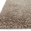 Close-up side angle highlighting plush shag yarn texture in light brown and beige tones