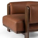 Close-up view of thick leather seat cushion with fine stitching