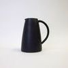 Thomas Black Garden Pitcher in matte black ceramic with narrow spout and curved handle