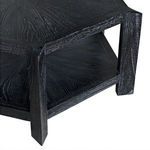 Close-up showing texture and grain of black mindi wood on corner leg and lower shelf edge