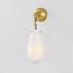 Side view of Clarkstown Wall Sconce showing illuminated frosted white glass shade and brass chain detail