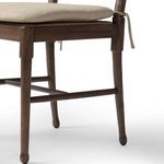 Fayth Dining Chair angled side view showing wood brace structure beneath seat
