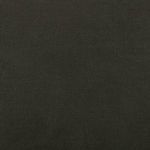 Detailed close-up capturing the deep green linen fabric texture under light