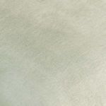 Close-up of sage green fabric texture showing linen blend weave