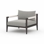 Sherwood Outdoor Faye Ash Bronze Chair with dark aluminum frame, gray patterned cushions, and rope-wrapped armrests