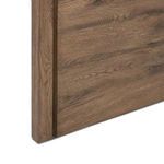 Close-up side view of Henry Coffee Table leg showcasing solid oak construction and smooth curves