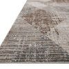Low angle showing the rug’s thin profile and tight weave texture