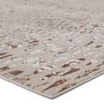 Close-up on Kimball Animal Rug edge showing detailed weave and texture in beige and bronze shades