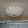 Rosehill Large Semi-Flush Mount installed on ceiling above blue cabinetry, showing room context and lighting effect