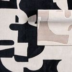 Inset showing rug's underside with color shifted to natural beige and taupe tones