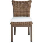 Frontal view of Montecito chair with white cushion and detailed rattan weave