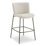 Early stool angled view showing seat and back curve with slim metal frame and footrest