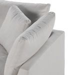 Close-up of back cushions showing soft fabric texture and stitching on cushion edges