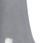 Close-up showing the textured mottled gray glazed ceramic body