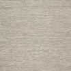Grey rug with subtle chevron wave pattern hand-woven from jute, wool, and cotton with fringed edges