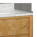 Close-up side angle showing textured rattan pattern and brass knob on top drawer