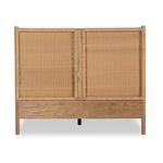 Side profile showing footboard and headboard panels' woven texture and wood frame color