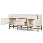 Angled side view with left and right cabinet doors open and all drawers extended