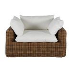 Front-facing view of chair with cushions arranged on woven wicker frame