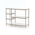 Side view showing narrow depth and layered white marble shelves with brass frame