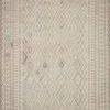 Malik Ivory Stone Rug with warm ivory tones and bold geometric diamond pattern