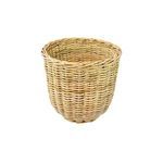 Close-up front view of the largest natural rattan basket showing detailed weaving pattern