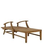 Croquet teak chaise viewed from opposite side with natural wood finish and no cushions.
