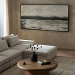 Living room setting showing painting above sofa with natural light illuminating textured wall