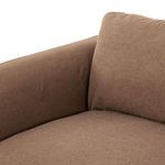 Corner join between armrest and back cushions highlighted in linen fabric