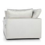 Back view showing low squared back and removable cushions of sectional sofa