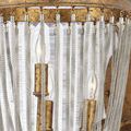 Close-up of gold ring and lights showing texture of chains and candle-style bulbs