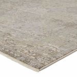 Close-up on corner showing low pile texture and cream fringe edge