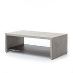 Angled view from top showing the table in light grey with floating black shelf underneath
