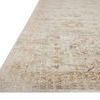 Close-up of Marcella Sage Gold Rug edge with visible low pile texture and intricate border pattern