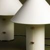 Close view of lamp's front showing brass clasps stitching detail on parchment lamp body