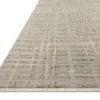 Wade Mist Gold Rug displayed from low side angle highlighting low pile and fringe detail
