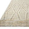 Angled side view of Kenzie Ivory/Sand Rug showing texture and low profile weave