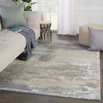 Rug placed in living room setting with sofa, side table, and window lighting