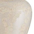 Textured ceramic lamp base close-up showing the irregular ivory and cream swirling pattern