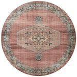 Round rug shape featuring the same medallion design and color palette of spice with aqua border
