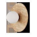 Side angle showing the frosted glass globe protruding from the flat travertine disc
