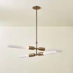 Darby Chandelier shown installed in neutral room with warm walls and ceiling