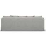 Straight back view of sofa showing slipcovered back panel and top edges of cushions