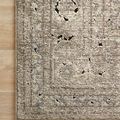 Close-up of Millennium Sand Ivory Rug corner showing texture and detailed woven pile on light wood floor