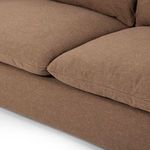 Zoomed seat cushions showing soft quilted edges and linen weave