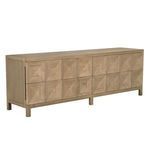 Three-quarter view showing side panel and depth of washed walnut sideboard with geometric face