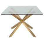 Couture Dining Table viewed from the side highlighting the symmetry and cross pattern of the gold metal legs