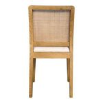 Back view of Orville chair showing rattan woven panel framing and wooden legs